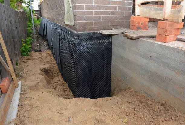 SJ Waterproofing Pros technician performing targeted Waterproofing assessment in Saint Paul Park, MN